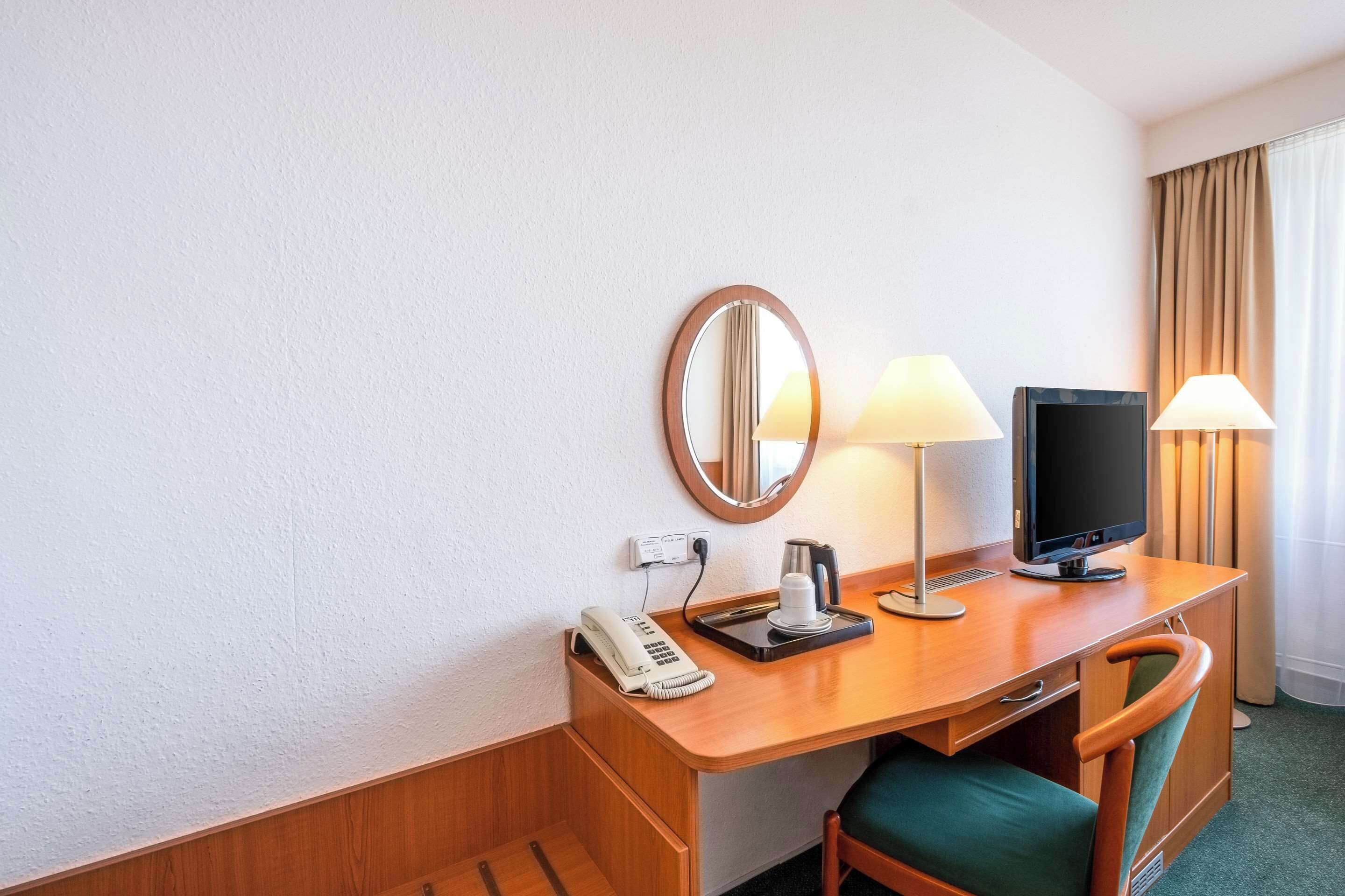 standard double room | in-room safe, desk, laptop workspace, blackout curtains