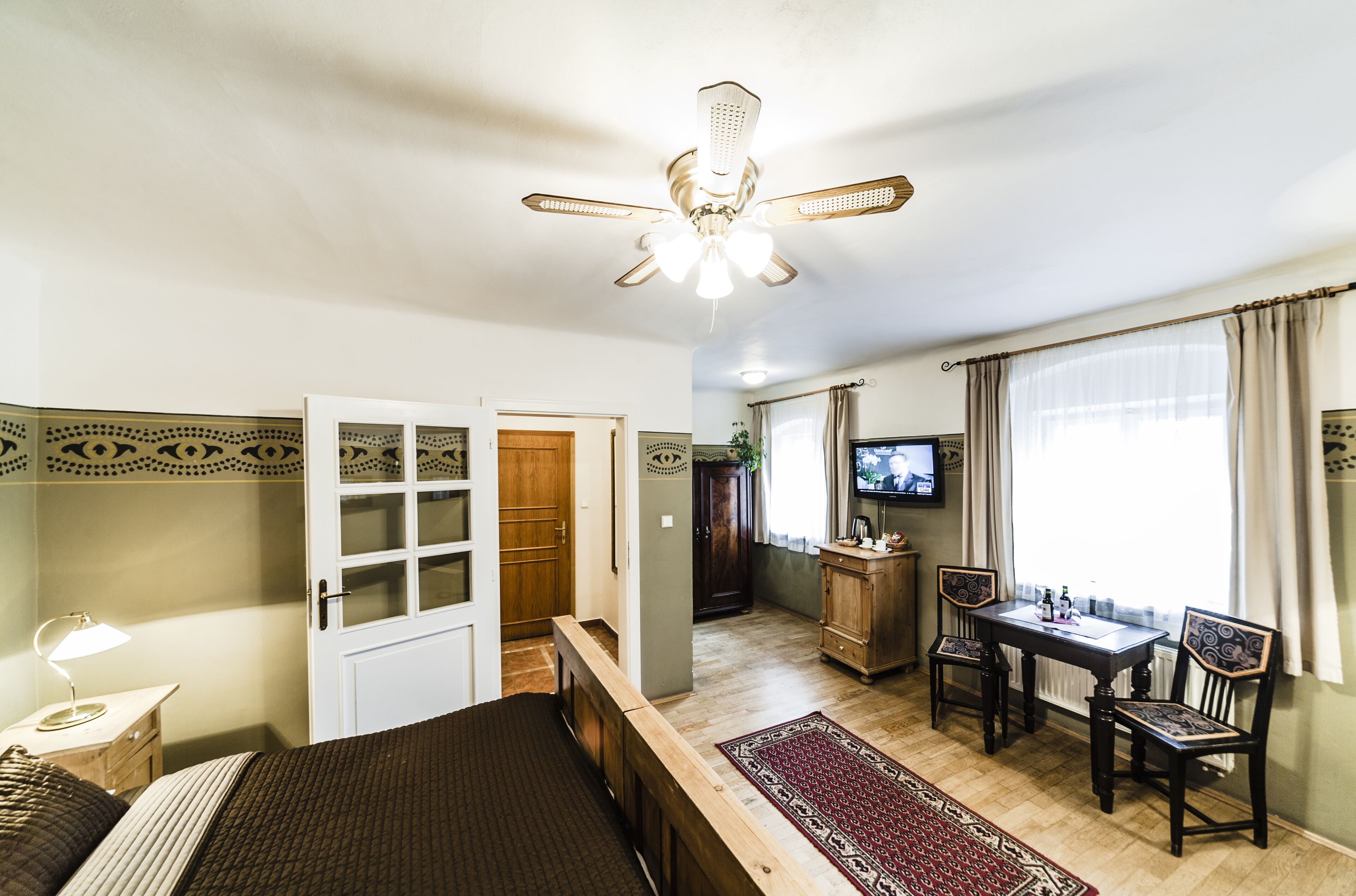 standard double or twin room, river view | 1 bedroom, in-room safe, desk, iron/ironing board