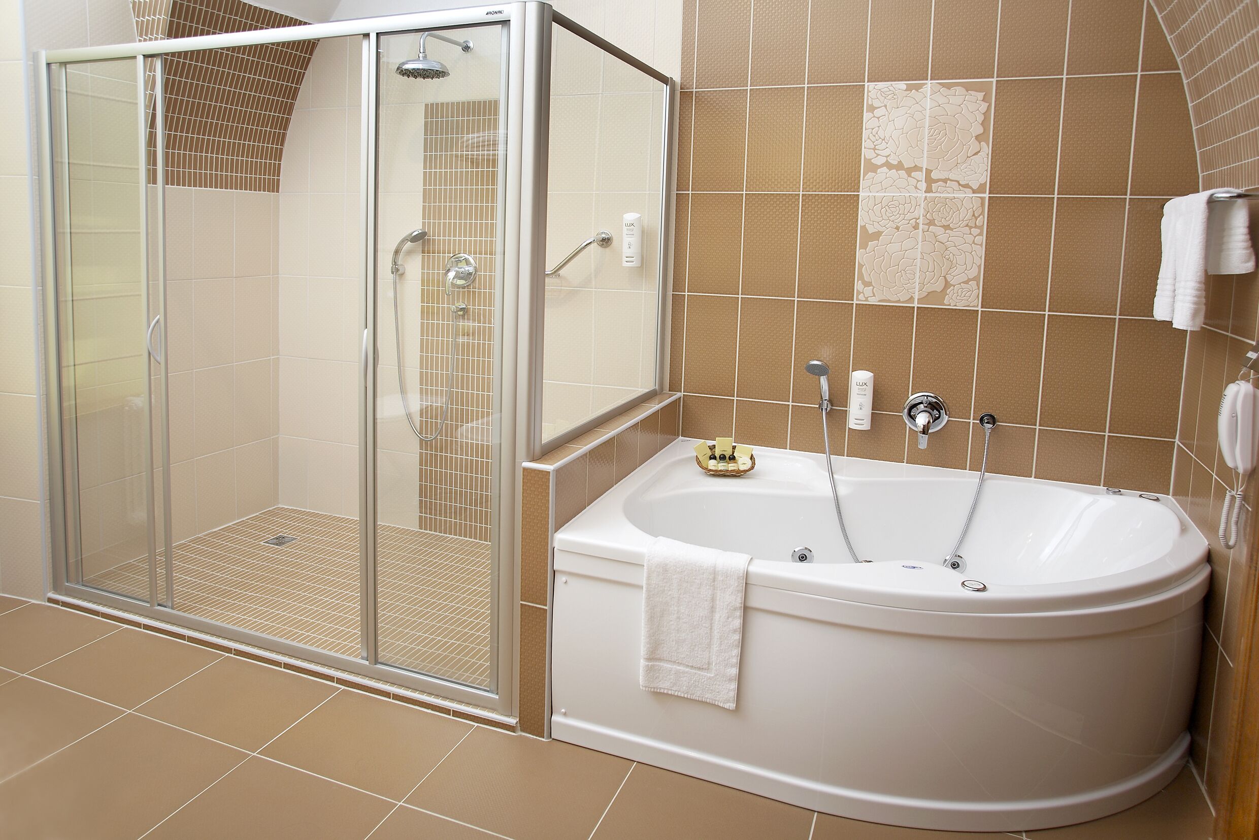 suite, 1 king bed, hot tub | bathroom | rainfall showerhead, free toiletries, hair dryer, towels