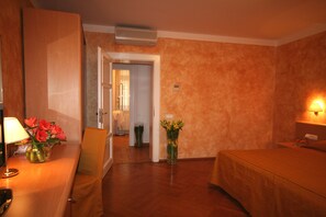Premium bedding, down comforters, minibar, in-room safe