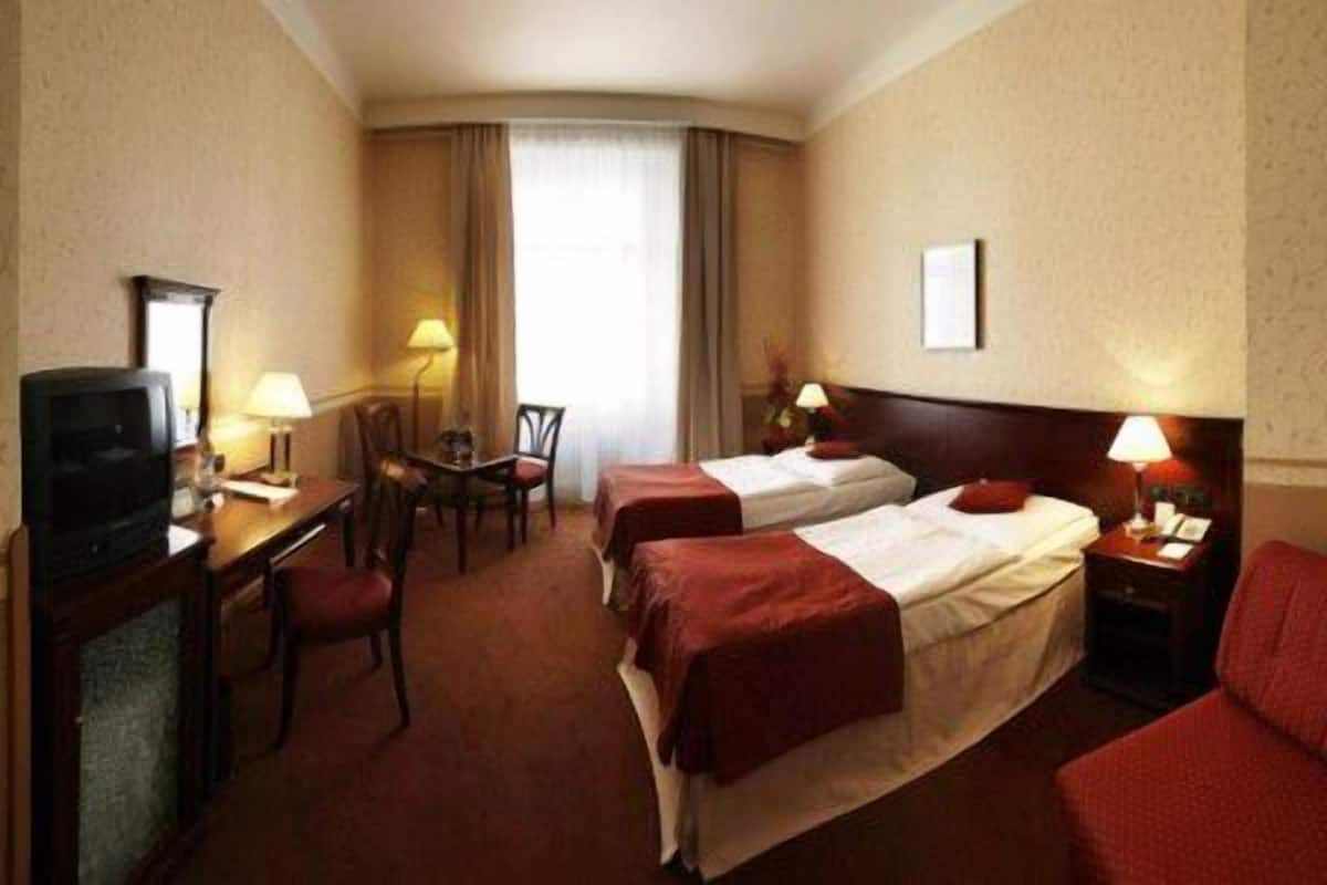 Hypoallergeen beddengoed, een minibar, een kluis op de kamer