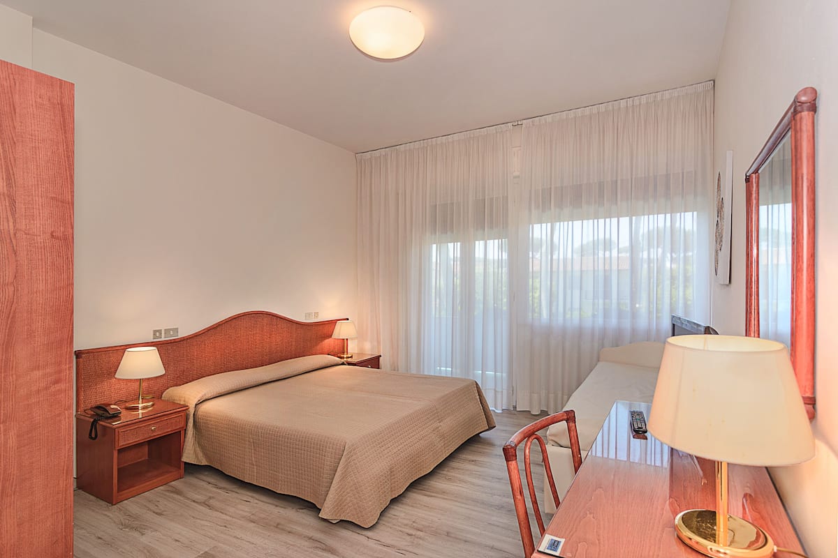 Family Room, Balcony, Garden View (and Swimming Pool View) | 1 bedroom, Frette Italian sheets, minibar, in-room safe