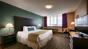 Chambre Affaires, 1 très grand lit, non-fumeurs, four à micro-ondes | Bureau, fer et planche à repasser, lits bébé (gratuits), Wi-Fi gratuit