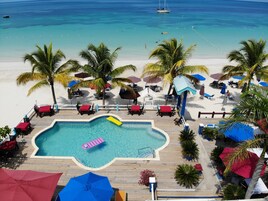 On the beach, sun loungers, beach umbrellas, beach towels