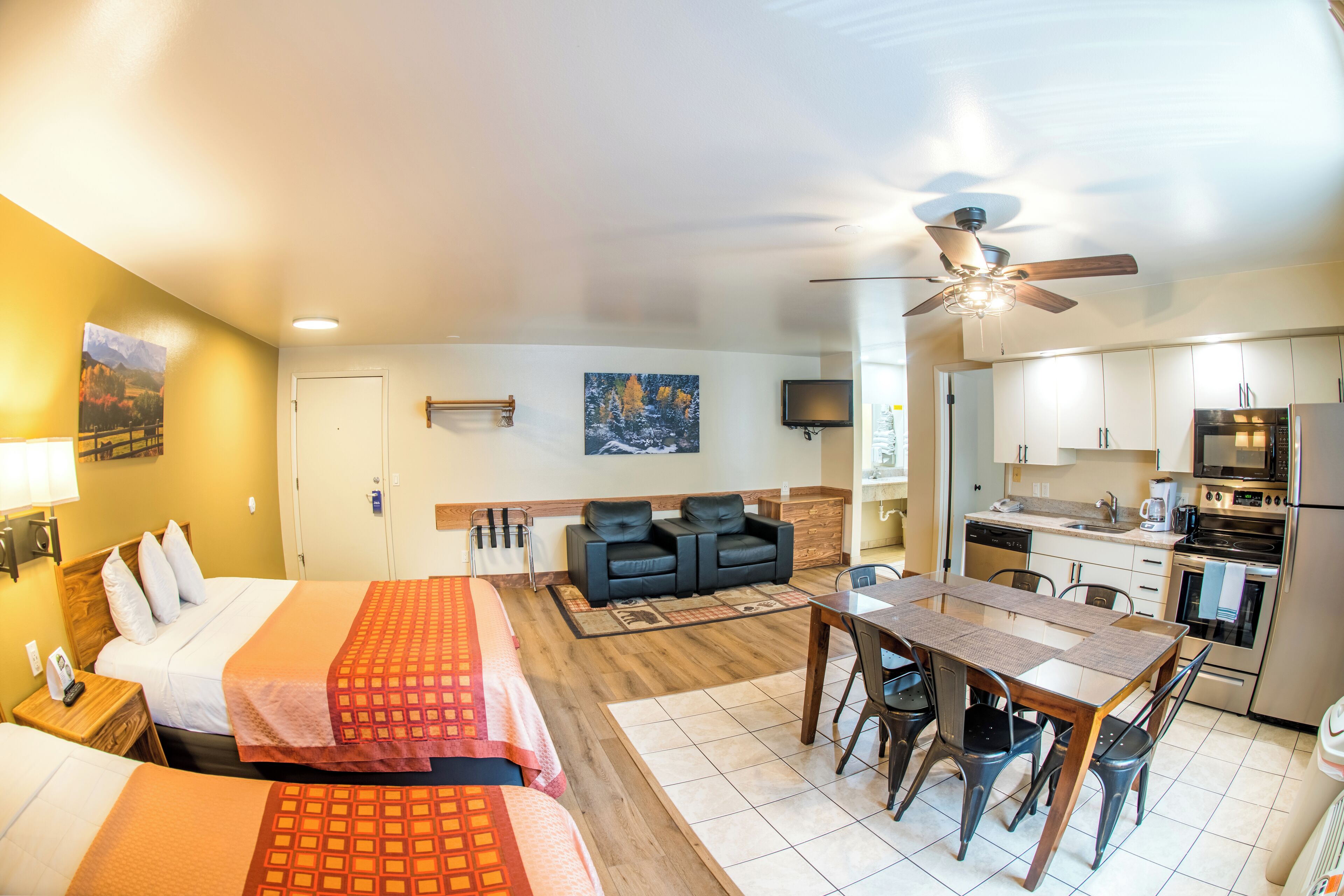 deluxe suite, multiple beds, kitchen | free wifi, bed sheets, wheelchair access