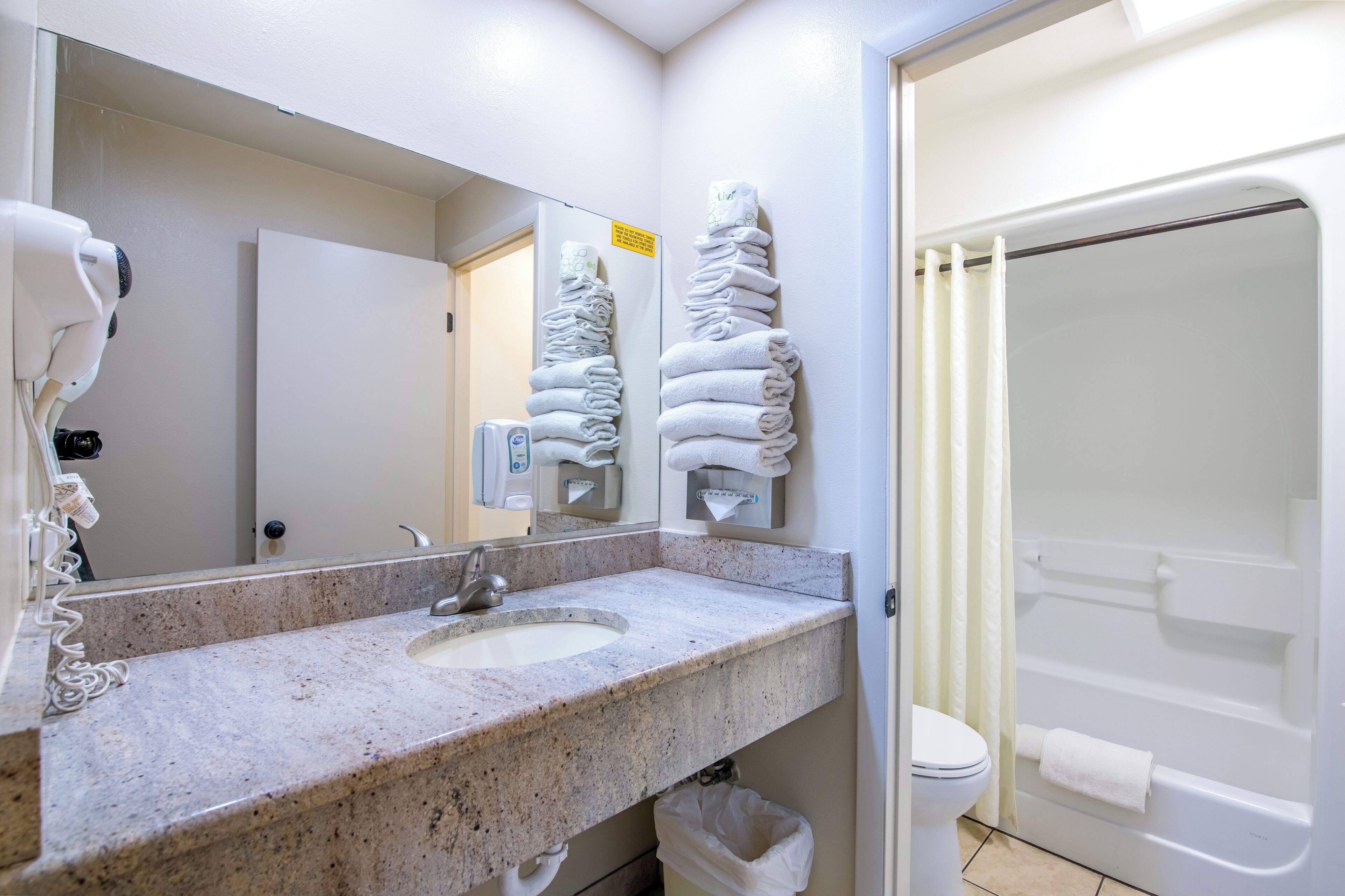 deluxe suite, multiple beds, kitchen | bathroom | combined shower/bathtub, hair dryer, towels