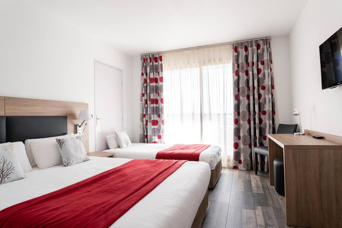 Triple Room | In-room safe, iron/ironing board (on request), cribs (free)