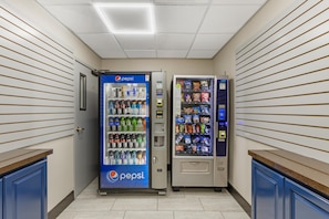 A vending machine area with Pepsi and Doritos vending machines. - Best Western Plus Omaha Airport Inn (Carter Lake)