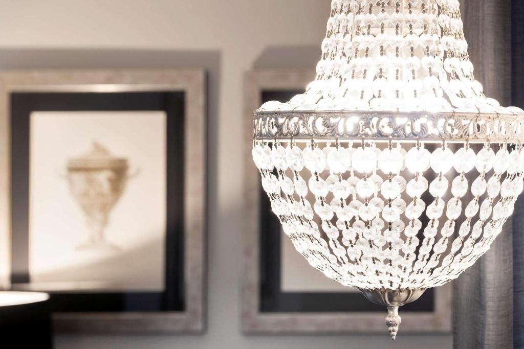 A chandelier with a detailed, ornate design.