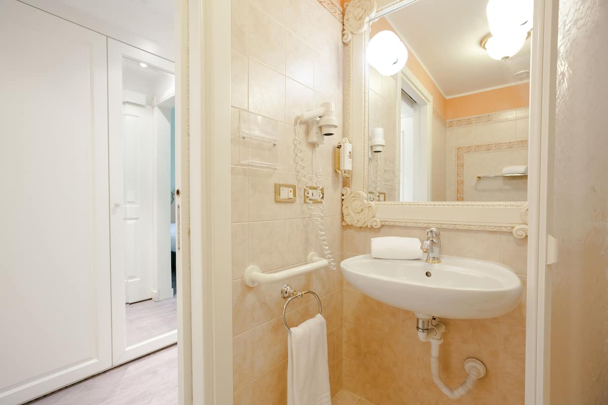 classic room, 1 king bed with sofa bed | bathroom | deep-soaking bathtub, hair dryer, bathrobes, towels