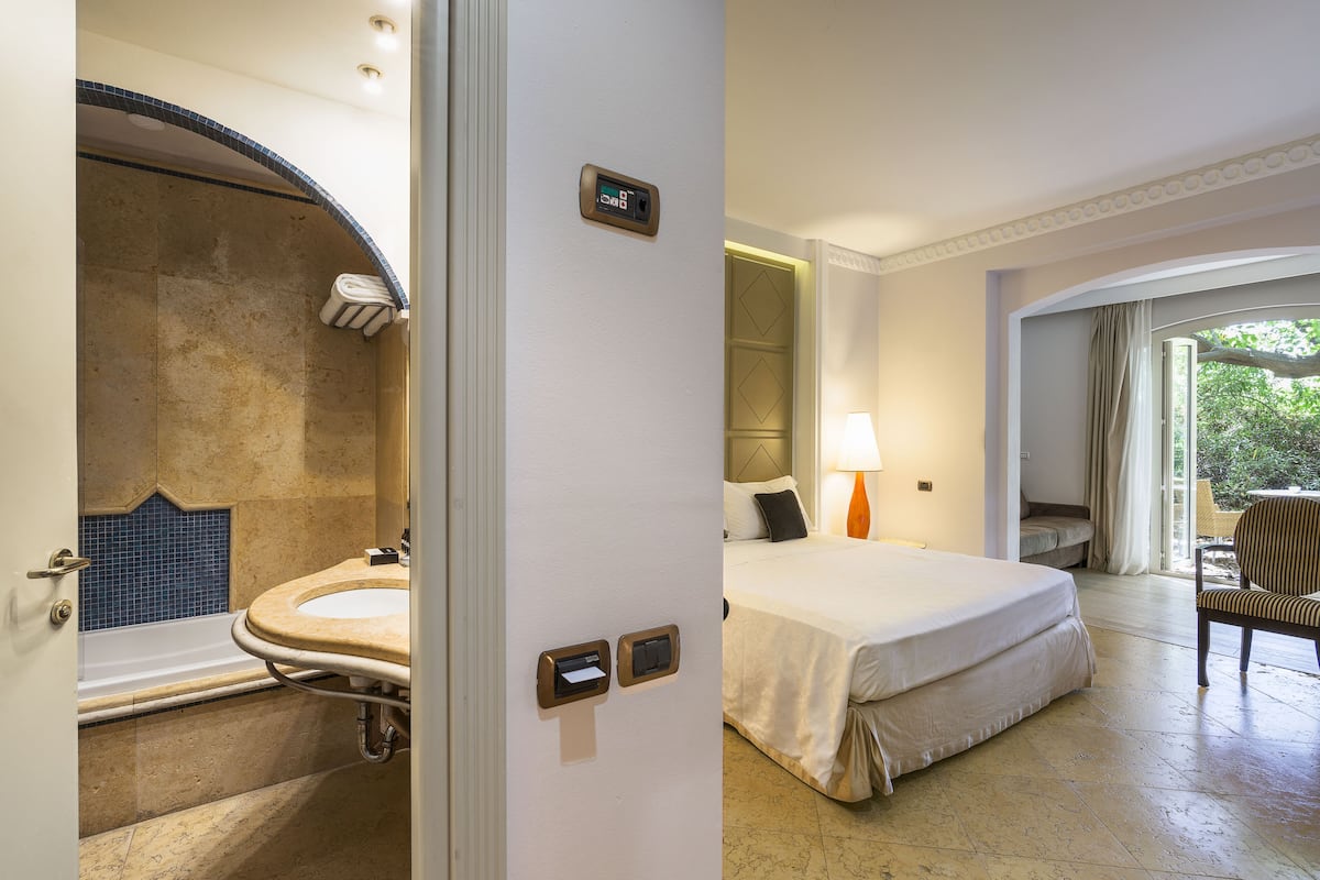 classic double or twin room | bathroom | rainfall showerhead, designer toiletries, hair dryer, slippers