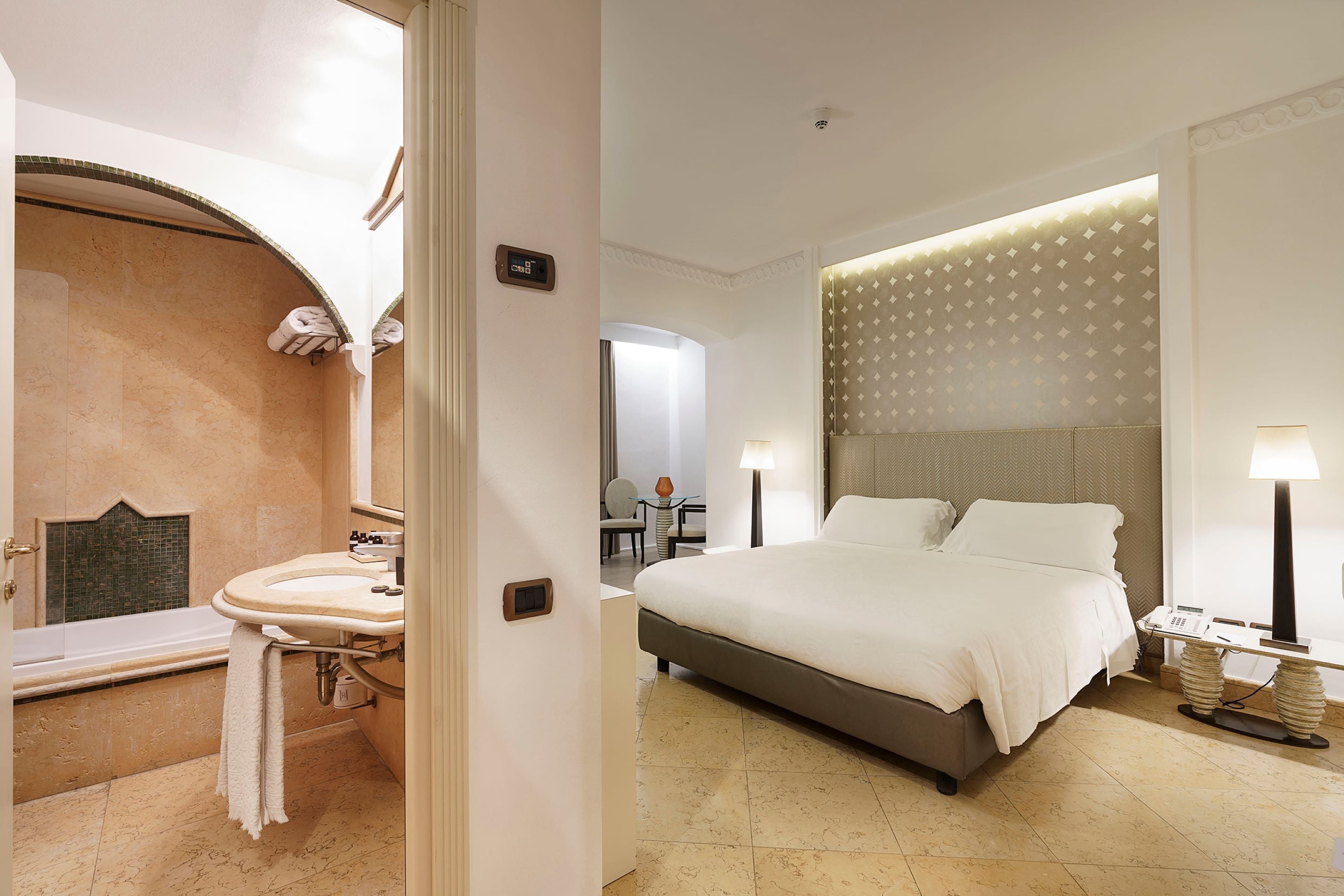 rainfall showerhead, designer toiletries, hair dryer, slippers