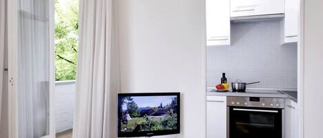 Fridge, microwave, stovetop, coffee/tea maker