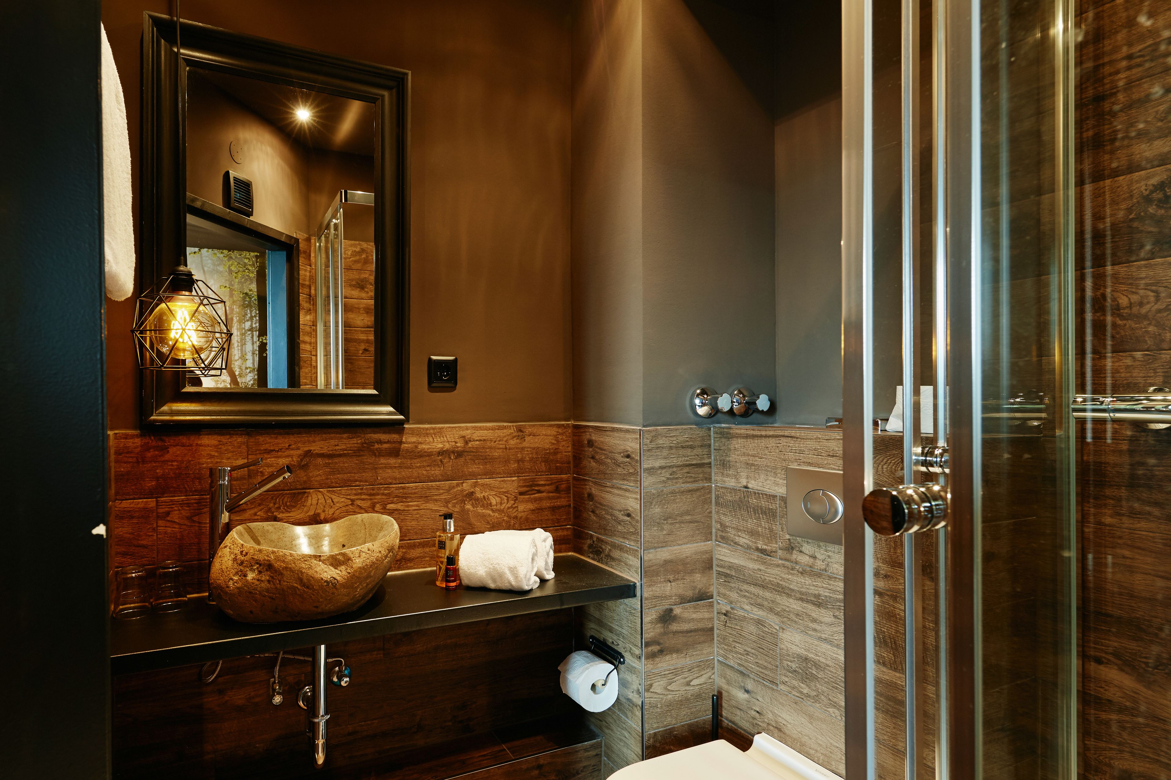 shower, designer toiletries, hair dryer, towels