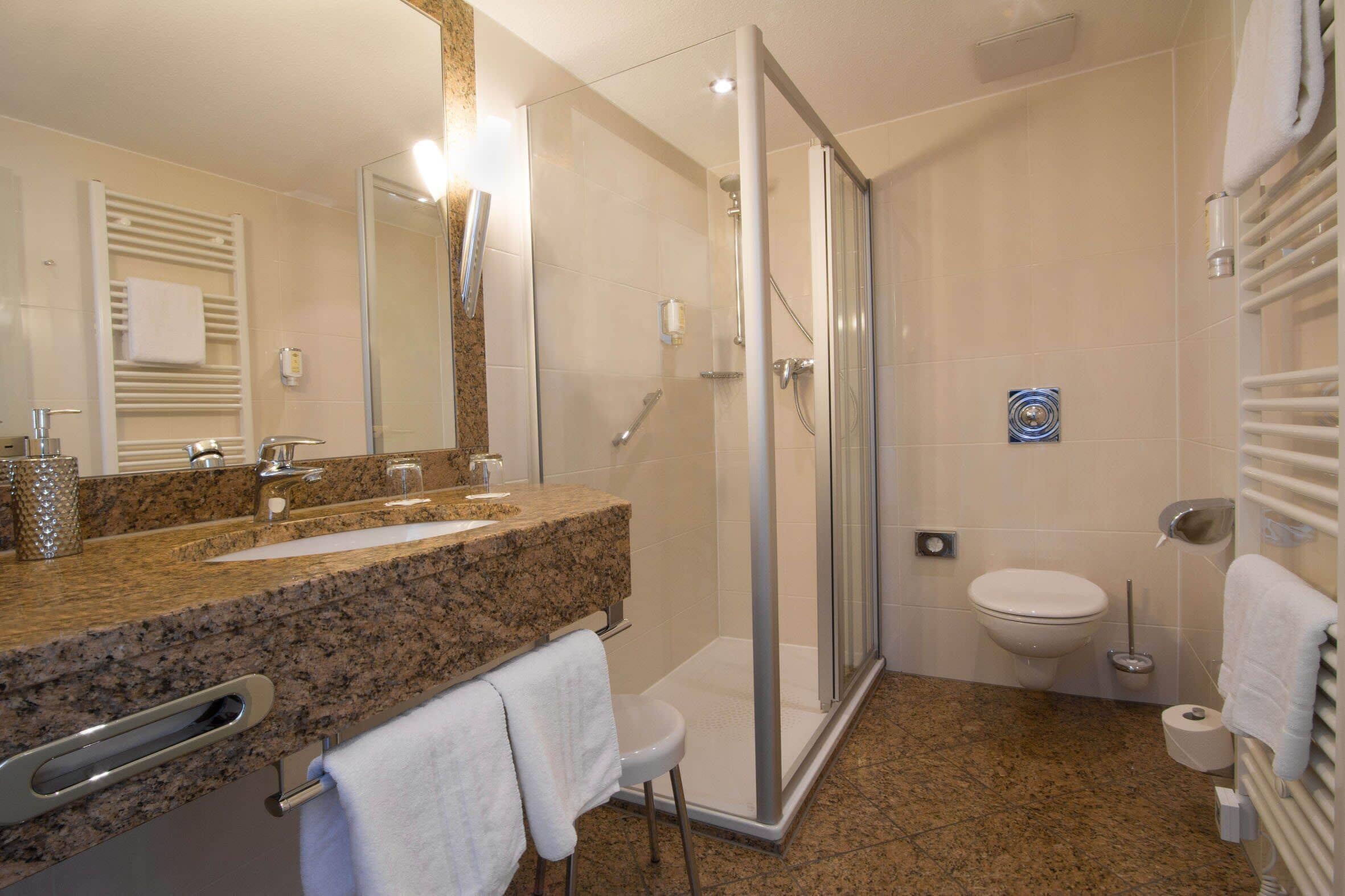 superior double room | bathroom | eco-friendly toiletries, hair dryer, bathrobes, slippers