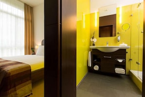 Shower, eco-friendly toiletries, hair dryer, towels