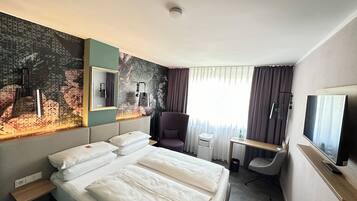 Hypo-allergenic bedding, down duvets, minibar, in-room safe