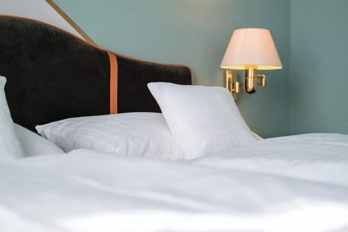 Hypo-allergenic bedding, desk, laptop workspace, iron/ironing board