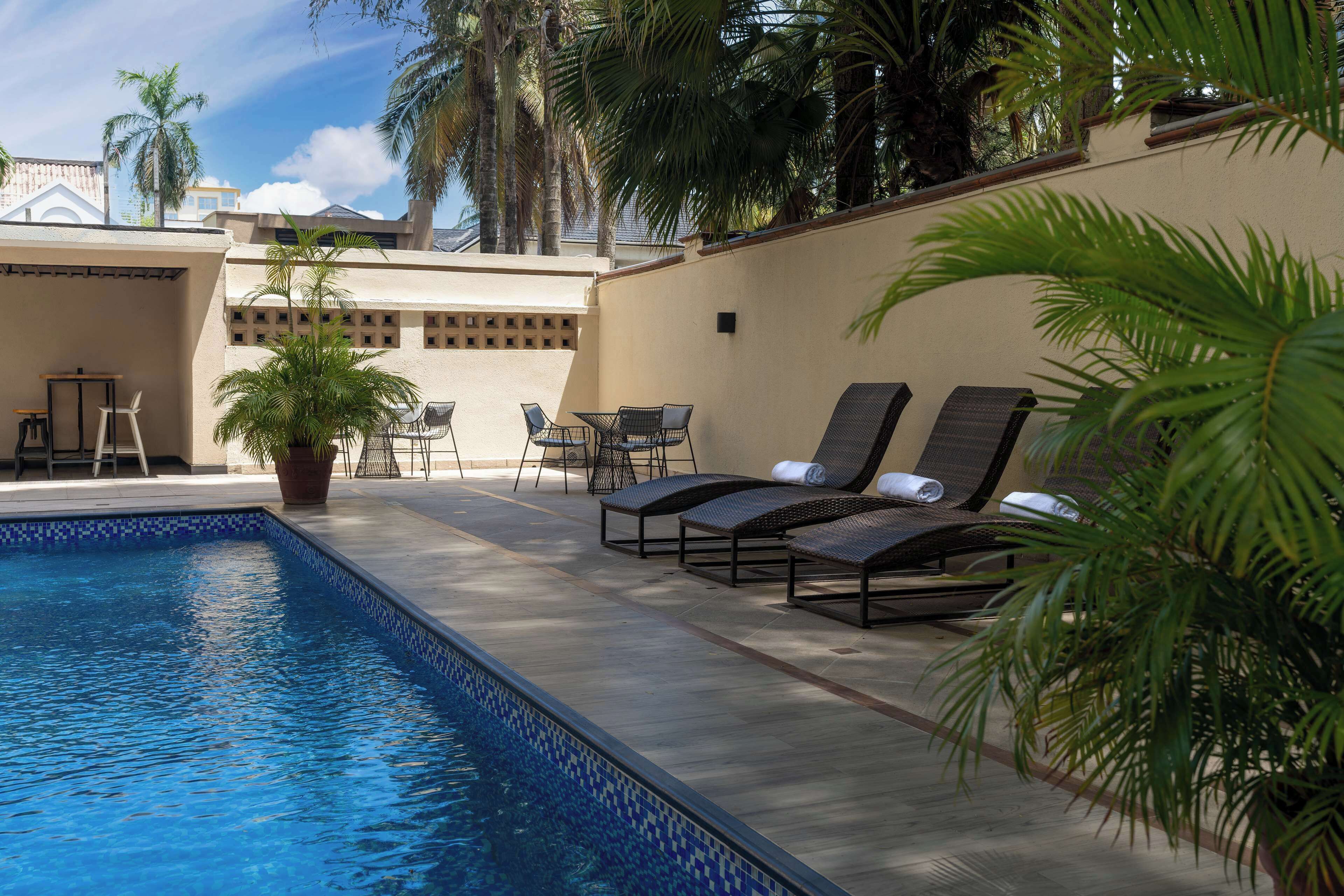 2 outdoor pools, pool umbrellas, pool loungers