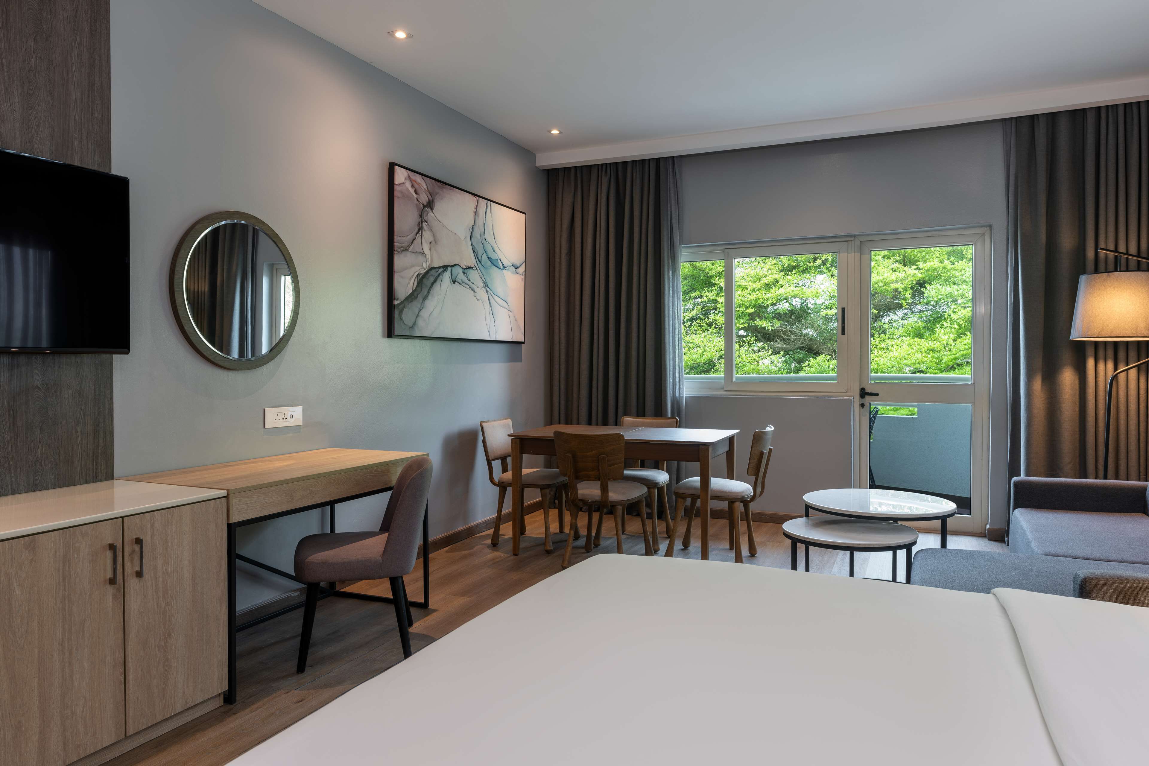 Premium bedding, down comforters, Select Comfort beds, minibar