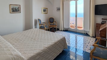 Quarto casal ou duplo econômico, vista para o mar, em edifício anexo | Frigobar, cofres nos quartos, Wi-Fi de cortesia, roupa de cama