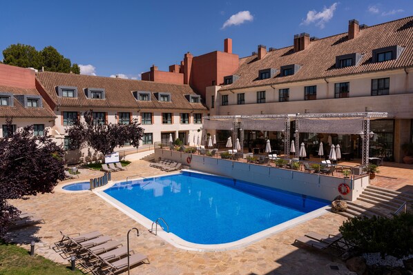 Outdoor pool, open 11:00 AM to 8:00 PM, pool umbrellas, sun loungers