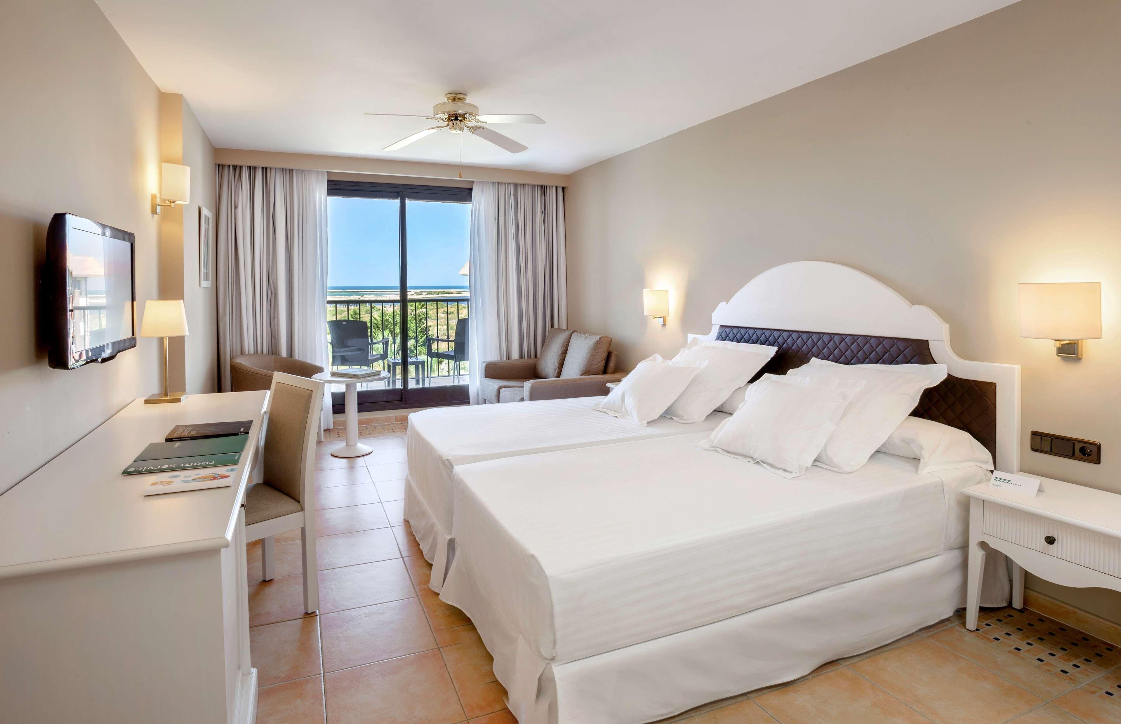 Premium bedding, pillowtop beds, minibar, in-room safe