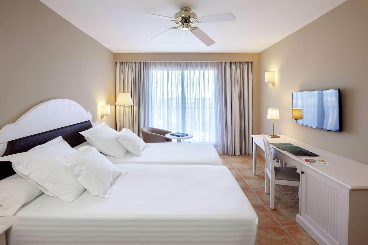 Premium bedding, pillowtop beds, minibar, in-room safe