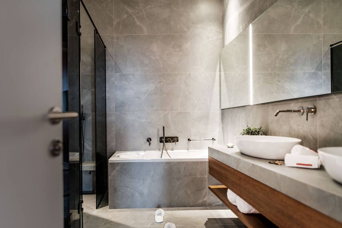 ambassador suite, balcony, sea view | minibar, in-room safe, desk, laptop workspace