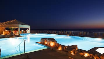 Indoor pool, pool umbrellas, pool loungers