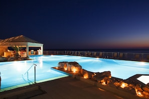 Indoor pool, pool umbrellas, pool loungers