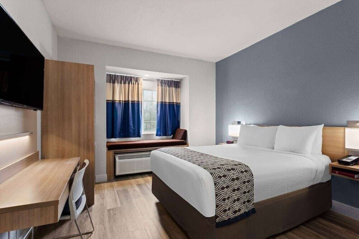 Premium bedding, desk, blackout curtains, iron/ironing board