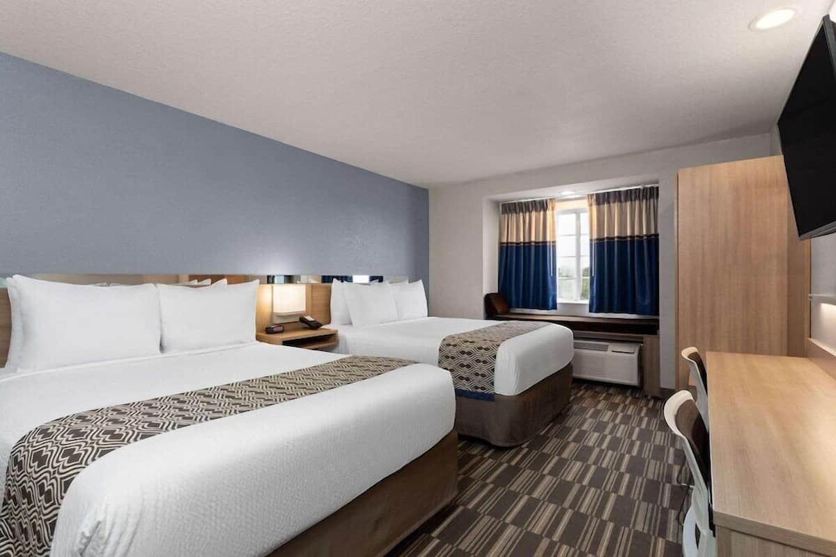 Premium bedding, desk, blackout curtains, iron/ironing board
