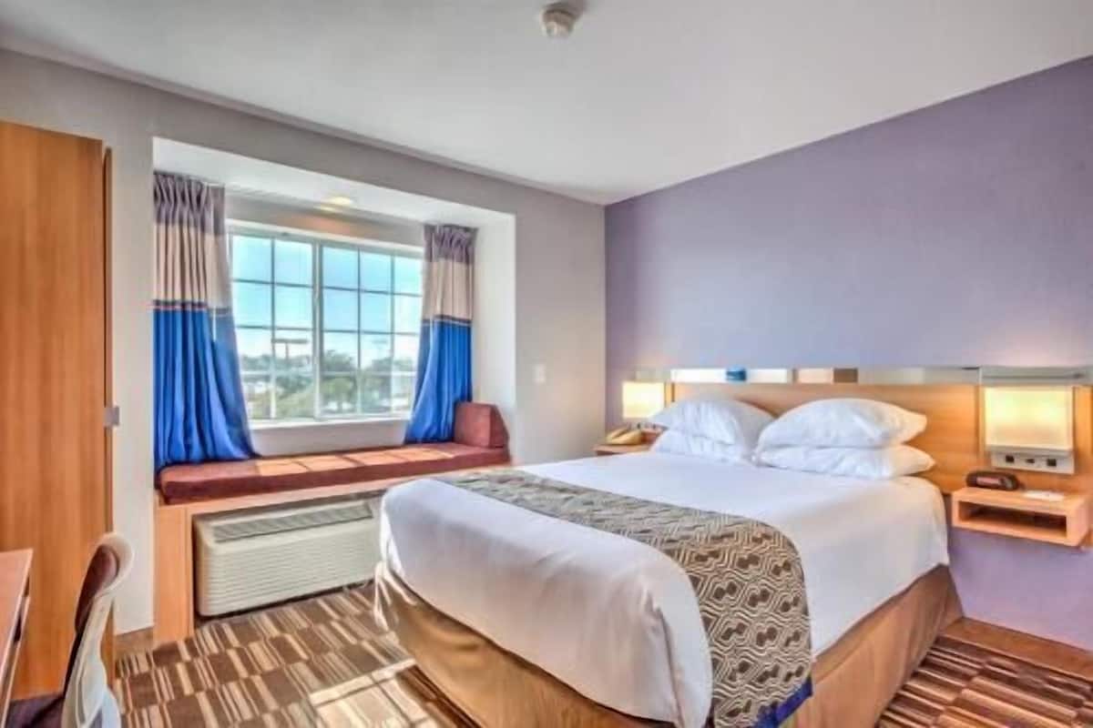 Premium bedding, desk, blackout curtains, iron/ironing board