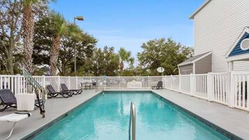 Seasonal outdoor pool, open 8:00 AM to 10:00 PM, sun loungers