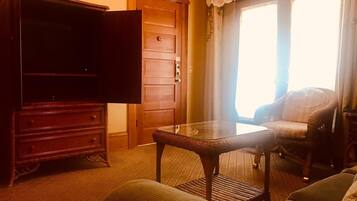 Premium Room, 1 King Bed with Sofa bed | Living area | LCD TV