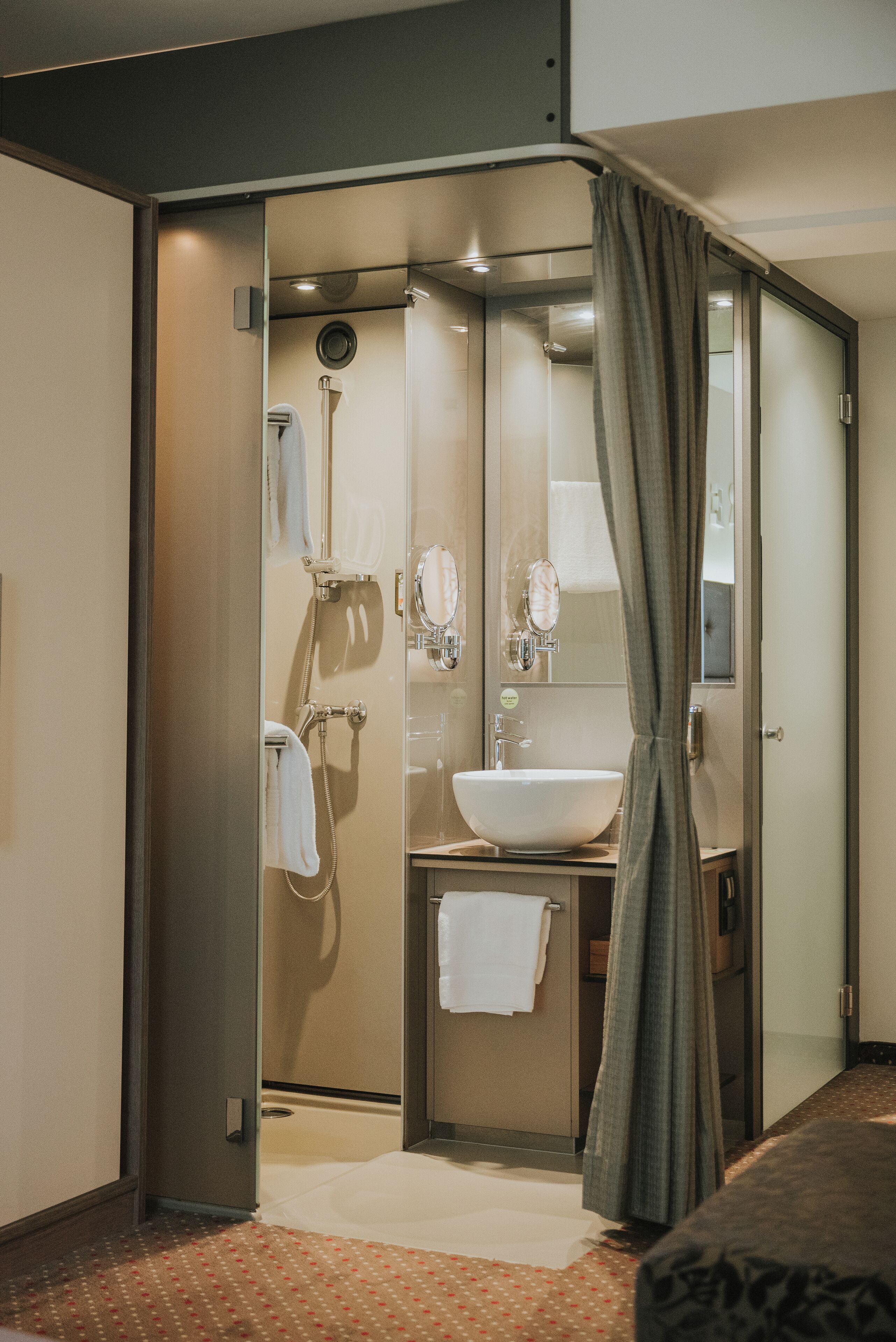 eco-friendly toiletries, hair dryer, towels