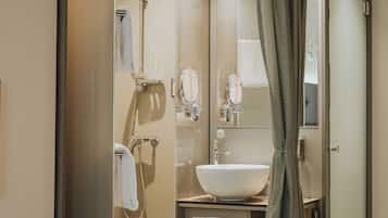 Eco-friendly toiletries, hair dryer, towels