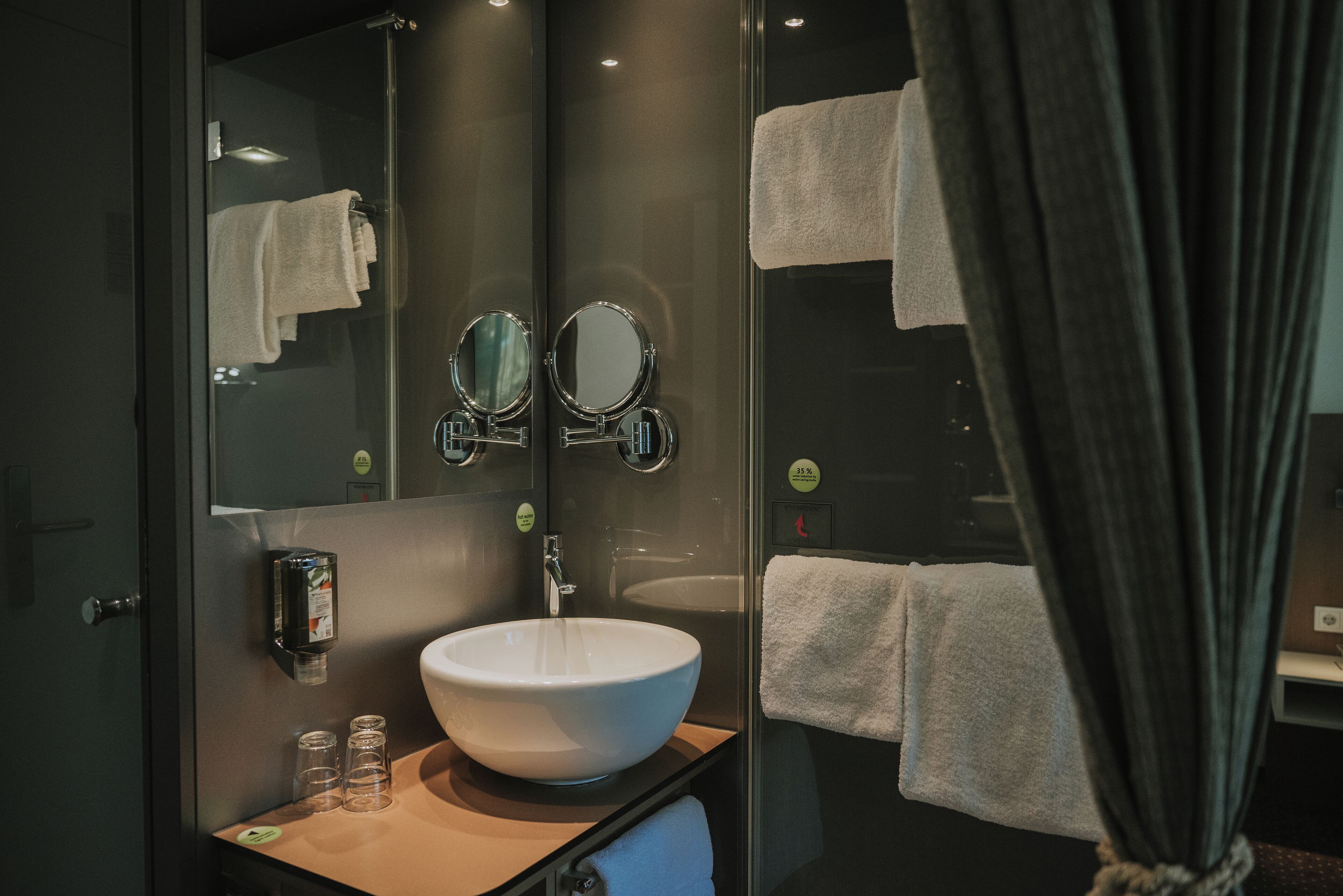 eco-friendly toiletries, hair dryer, towels