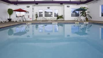 Indoor pool, open 6:00 AM to 11:00 PM, pool umbrellas