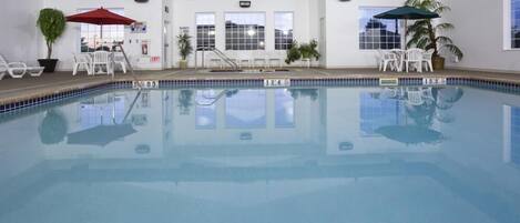 Indoor pool, open 6:00 AM to 11:00 PM, pool umbrellas