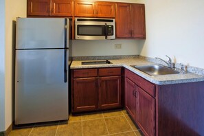 Roupas de cama premium, cofres nos quartos, escrivaninha