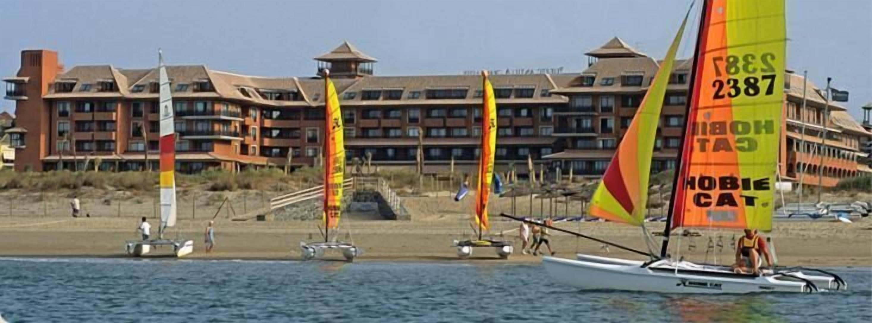 Windsurfing, beach volleyball, surfing, sailing