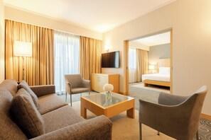 Suite | Área de sala de estar | Televisión LCD 