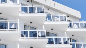 A multi-story building with balconies and windows, likely a hotel or residential building. - Essence Hotel Boutique (Torremolinos)