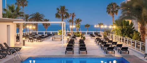 Outdoor pool, pool umbrellas, pool loungers