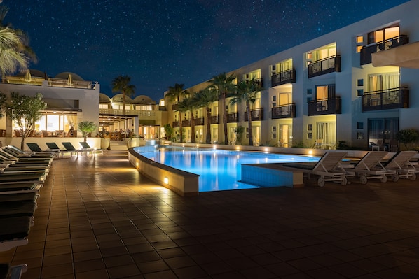 Outdoor pool, pool umbrellas, pool loungers