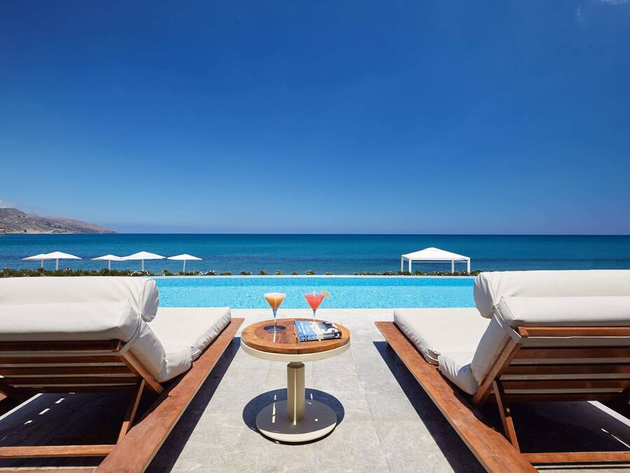 Junior Suite, Beachfront (Sharing Pool -AD) | Terrace/patio