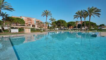 Indoor pool, outdoor pool, pool umbrellas, sun loungers