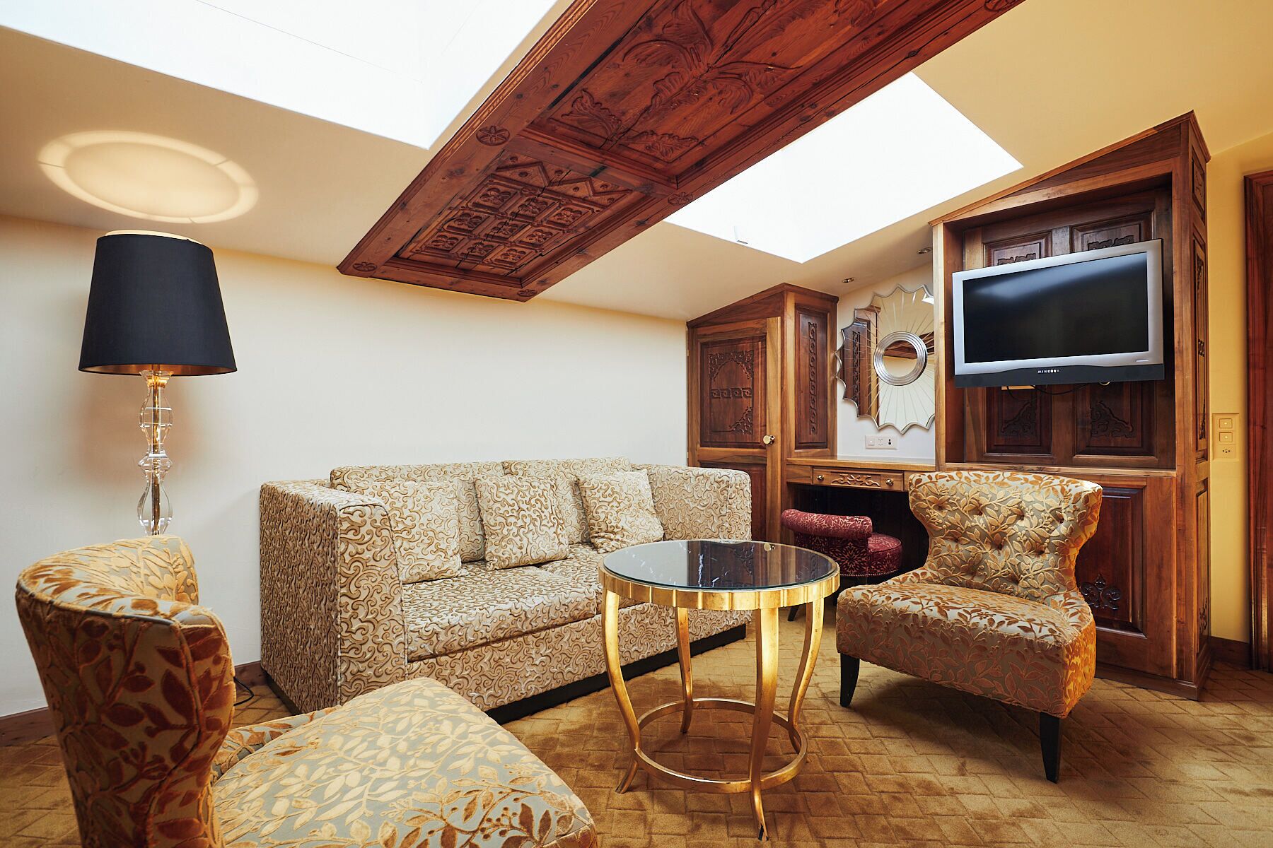 classic junior suite | living area | flat-screen tv